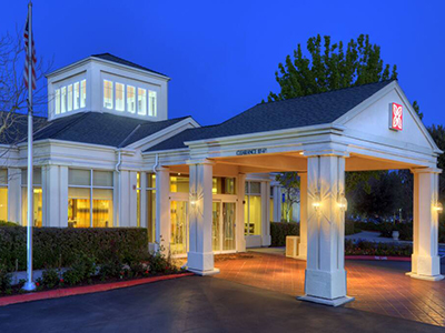 photo of a hotel entrance at dusk